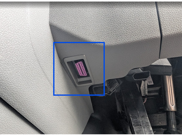 Locate the OBD-Port below the steering wheel in the driver’s footwell.