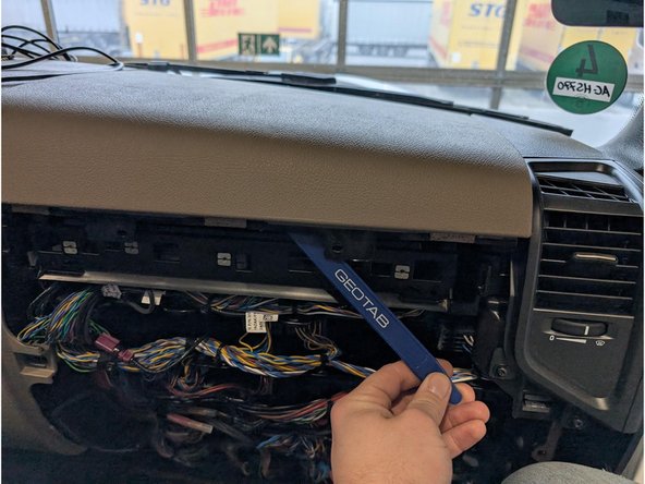 Remove the top cover to access mounting location for GO device