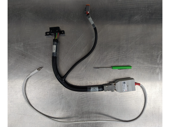 Plug custom Motiv harness DB connector to the Peak USB adapter DB connector. Tighten screws on DB connection using a mini flat head screwdriver