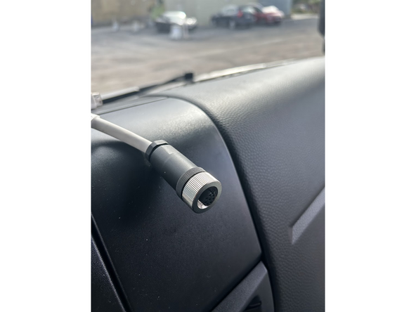 Connect HRN-CCZAUNO circular connector to the in-cab controller harness.