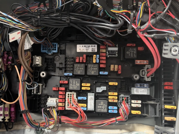Pull the ASAM control module to the side to get access to the main fuse panel.