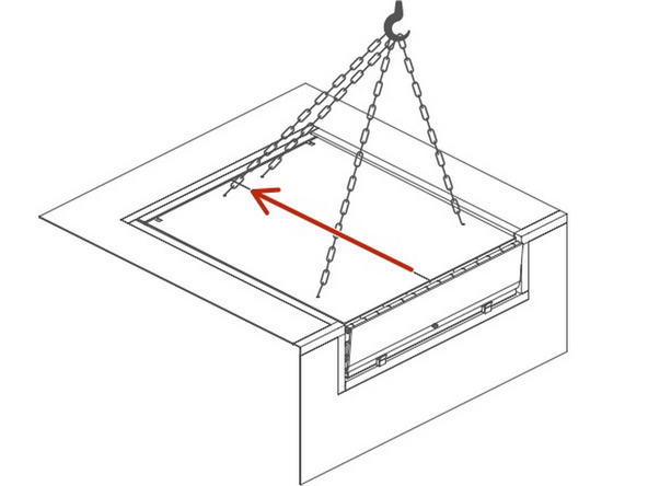 Carefully shift the leveler so that it sits tight up against the steel frame at the back of the pit.