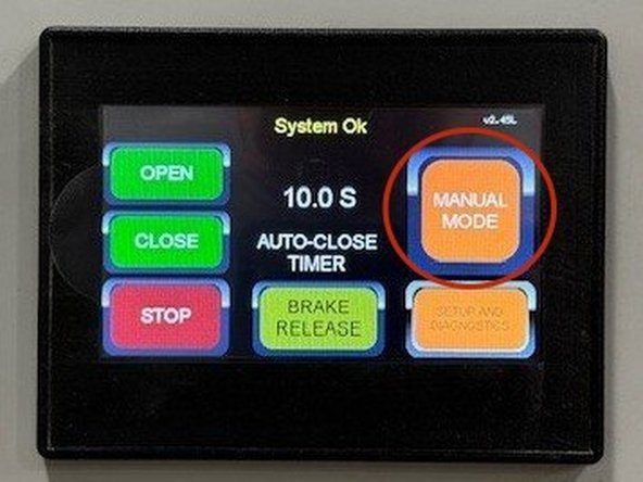 To adjust the level of track retention, first run the door open, and place it in "Manual Mode" from the operator screen.