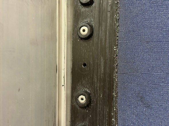 Grab (2) curtain tags and (1) Rivet.
