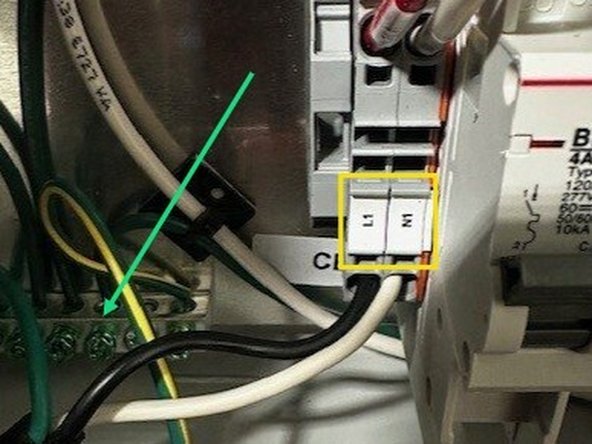 Route the power supply wires into the control panel via the provided entry points on the bottom of the enclosure.