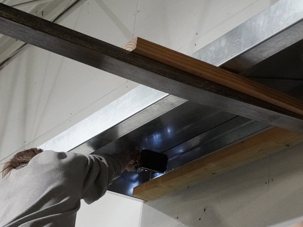 Once the Roof Assembly is in the desired location, using best practices for your surface material, anchor the (4) Gussets into the mounting surface.