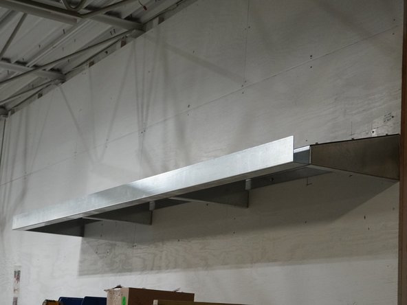 Once the Roof Assembly is in the desired location, using best practices for your surface material, anchor the (4) Gussets into the mounting surface.