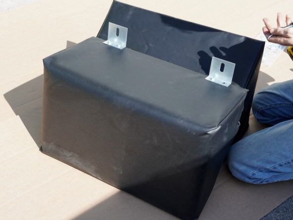 Using the provided Hex Head Screws, attach Angle Brackets on the inside and outside edge of the side pads. There will be one bracket 4&quot; from the top and bottom edges.