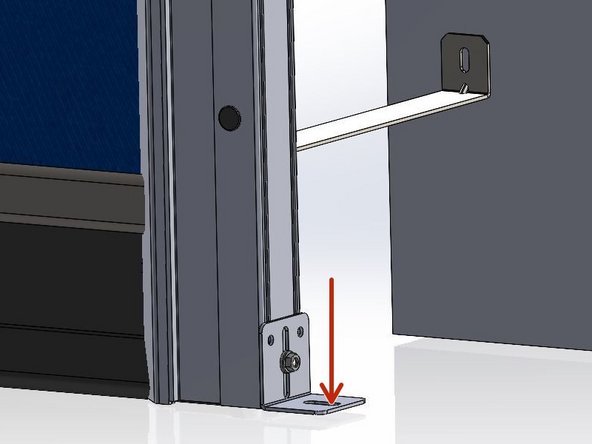 Drill directly through the bottom hole on the bracket into the floor.