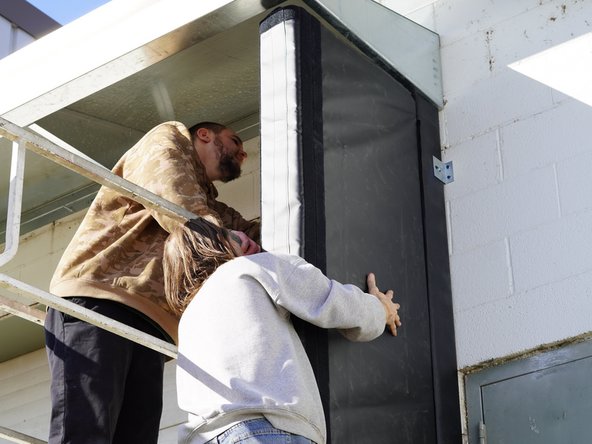 The front of the pad will have (2) strips of Velcro running up the length just on the inside of the left and right faces.