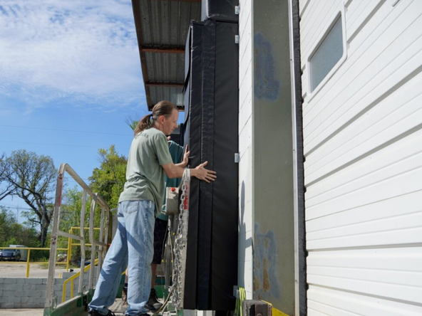 It helps to start from the top and work your way down, securing the Velcro as you go.