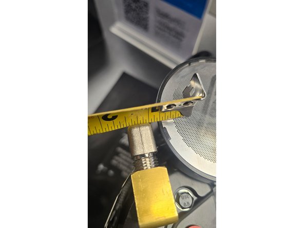 Install the brass street elbow fitting into the ARB Brushless compressor as shown in the first photo using an 11/16" open end wrench or crescent wrench. Make sure to use thread sealant on the NPT thread and the fitting should be oriented straight up as shown.