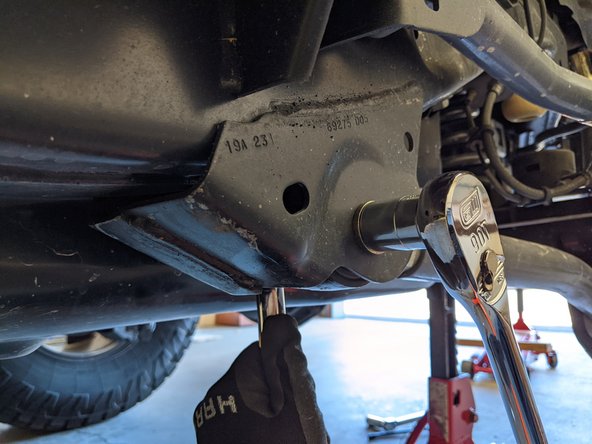 Remove one bolt at a time and replace with an M14-1.5 x 100mm bolt and lock nut with washers under the head of the bolt and lock nut.