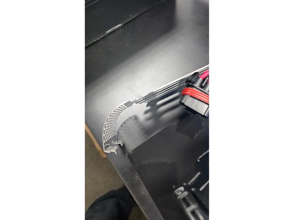 The heat shield unclips and removes from the compressor as shown.
