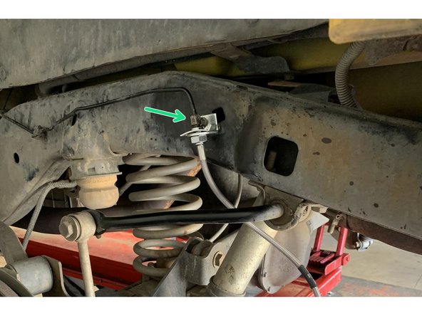 Thread the factory hard line nut into the Grimm OffRoad brake line.