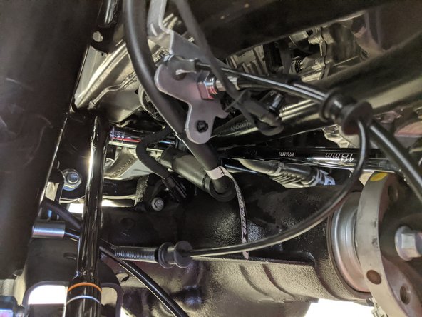 Move onto the front upper control arm axle side hardware.