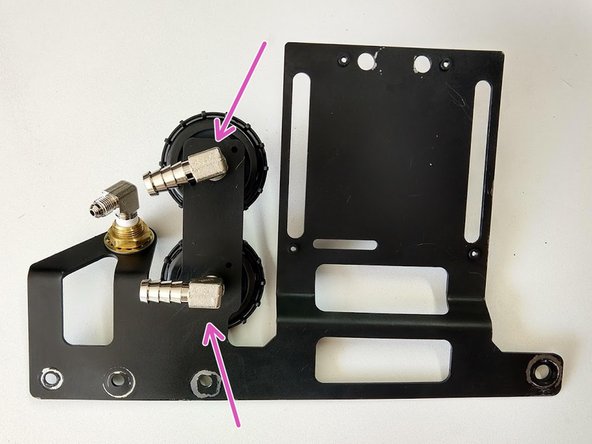 Thread the two 90 degree female 1/4” NPT x barb fittings onto the ARB filter nipples and tighten by hand. Match the alignment of the barbed fittings as shown in picture above.