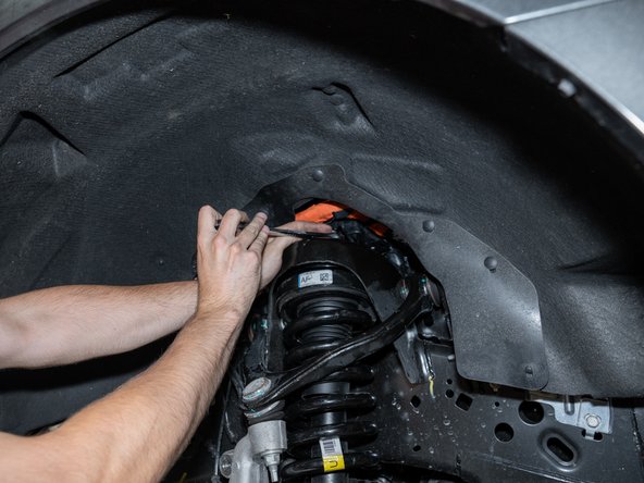 If an aftermarket alignment Caster/Camber Kit is being installed, install it now.