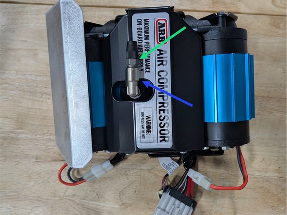 Install the 1/4F NPTF X 1/4 Male NPTF 90° elbow fitting into the outlet post of the ARB compressor. Make sure to use thread sealant on the NPT thread and orient the fitting as shown.
