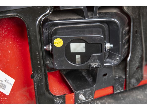 With a 1/2" socket/wrench, torque the 5/16" nylock nuts to 132 lb-in (11 lb-ft) [15 N-m].