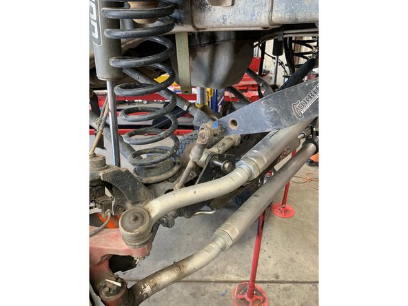 Replace with a 9/16-18 x 3&quot; bolt and lock nut with washers under the head of the bolt and lock nut.