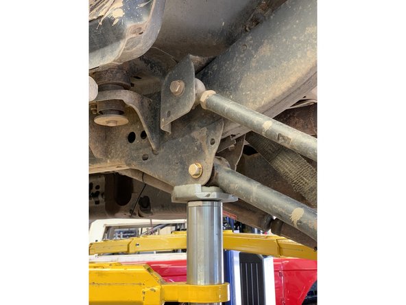 Repeat for all four bolts on both rear lower control arms.