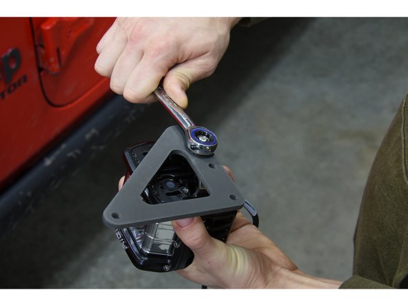 Attach the lights to the Grimm OffRoad A Pillar Light Mounts using the hardware supplied with the lights.