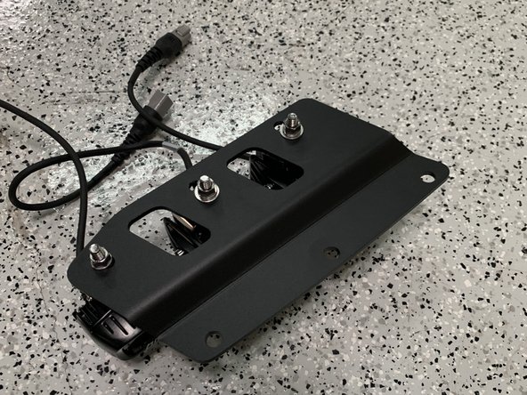 Note that there is a left and right bracket. The light mounting holes should be offset towards the outside of the vehicle.