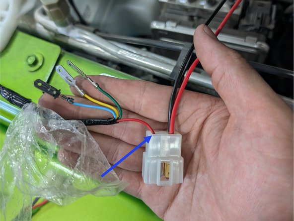 Connect the Grimm OffRoad black ground lead spade terminal and red power lead spade terminal to the white connector housing as shown.