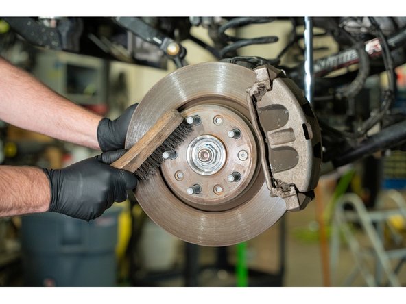 Using a wire brush or something similar, make sure the wheel mounting surface and wheel studs are cleaned thoroughly.