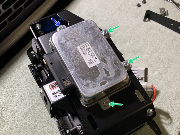 Loosely install one M6x1.0 25mm Carriage Bolt using a washer under the nylock nut. The PCM Side Support Bracket will install onto the M6x1.0 25mm Carriage Bolt once the compressor is mounted in place.