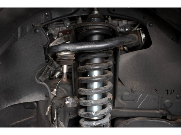 Support the spindle so that it does not over extend the CV joints when detached.