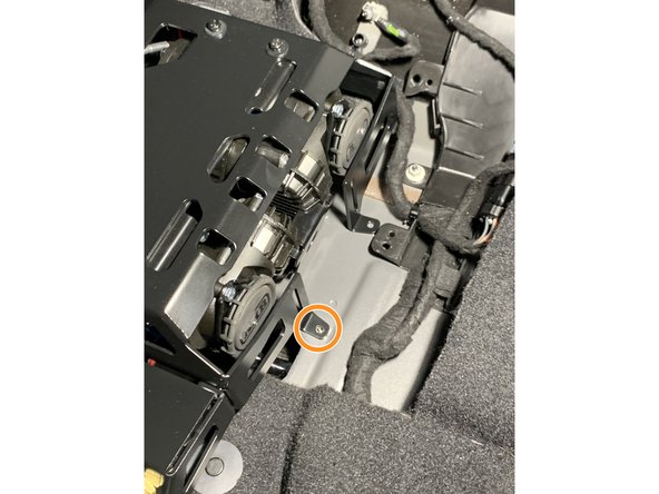 With the hole drilled earlier, insert the M5x.8 button head screw and secure with the external tooth lock nut.