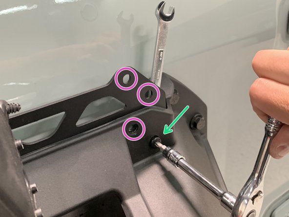 Use the supplied M6x1 20mm pan head screws and flanged nylock nuts to attach the Grimm OffRoad 3rd Brake Light Extension Bracket to the spare tire carrier using the lower mounting hole on each side.