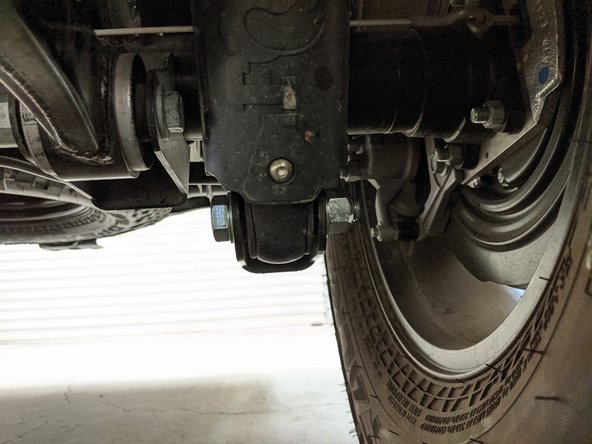 The lower eyelet of the shock will need to be supported before removing the shock bolt to prevent the shock from extending and coming out of the mount. With Nitrogen charged shocks it can be very difficult to get the shock back into the mount.