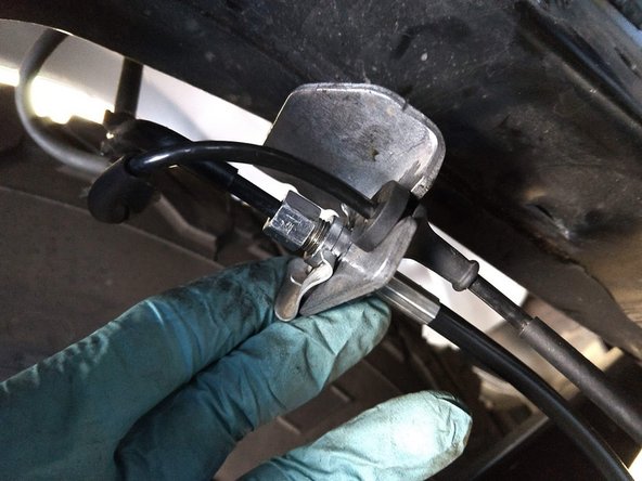 Be prepared to catch and clean up brake fluid.