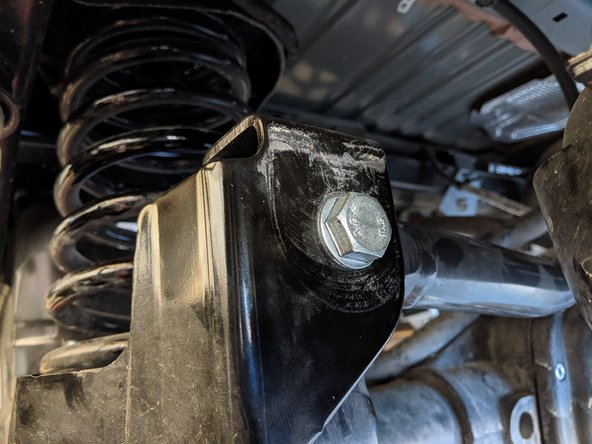 Make sure to hold onto the track bar so it doesn't drop out of the bracket.