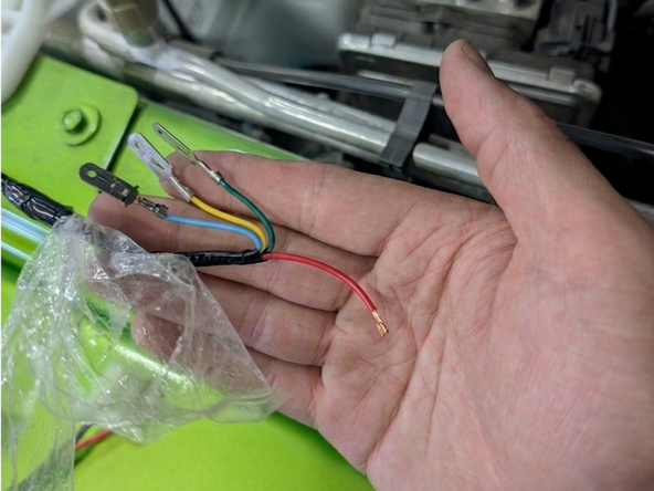 Cut off the terminal from the red wire, strip the wire, and crimp the Grimm OffRoad supplied spade terminal to the red wire.