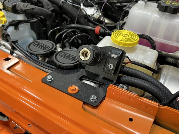 Start the vehicle and toggle the compressor switch to the on position. The compressor should turn on for a short period of time then turn off. If it doesn't, spraying the air connections with soapy water can help identify any leaks.