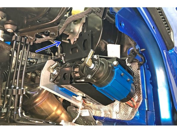 Install the compressor assembly onto the lower MC stud and the two firewall studs with the previously installed Grimm OffRoad spacer.