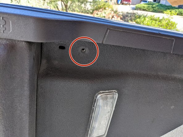 The Antenna mount utilizes the trailrail mounting bosses. Locate the boss at the rear left side of the bed.