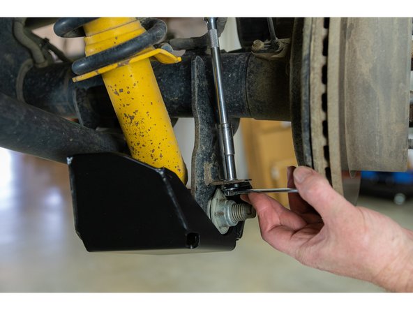 With a 10mm socket/wrench, torque the M6 bolt to 11 lb-ft (15 Nm).