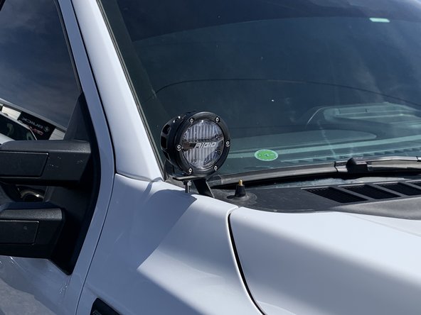 Install light onto the cowl bracket.