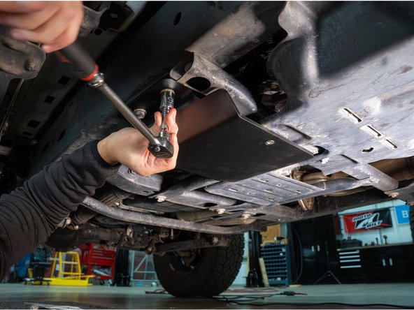 With a 16mm socket, torque the hex bolts to 52 lb-ft [70 Nm]