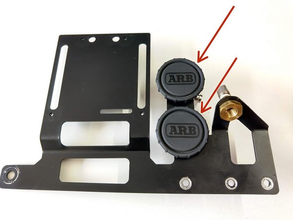 Install the ARB Compressor Filters on to the leg of the controls plate as shown.