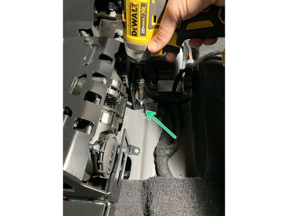 Attach the other forward mounting hole with the M5.5 self tapping screw and an 8mm nutdriver.