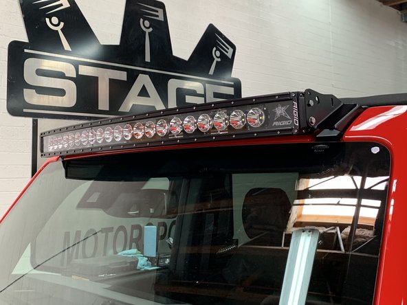 Wire light bar per light manufacturer's instructions.