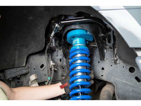 Re-install coilovers if they were removed.