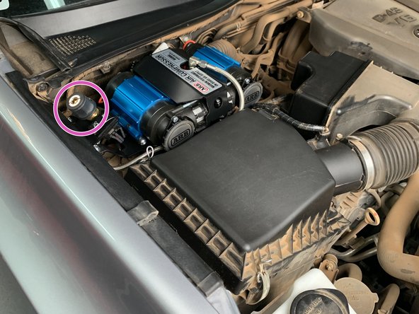 Use a 12mm socket/wrench to torque the hardware to 14 lb-ft [19 Nm].