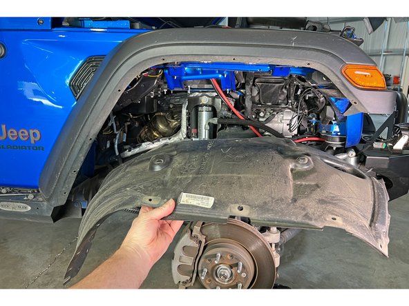 Remove inner fender.